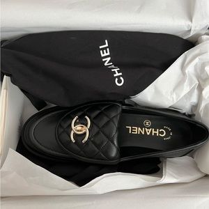 Chanel turn lock loafers